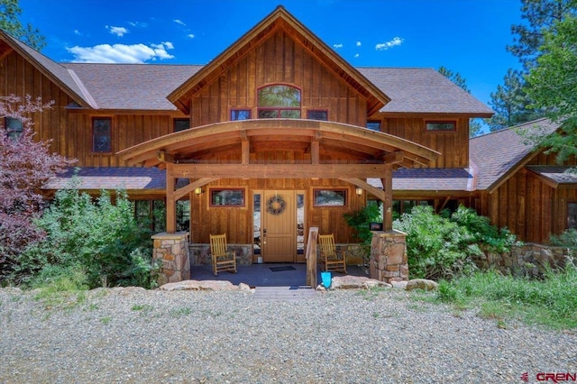 log cabin featuring a porch