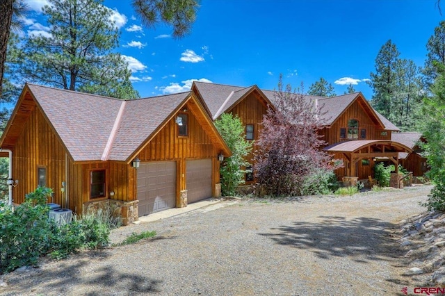 cabin featuring a garage