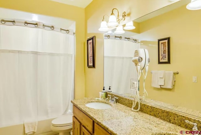 full bathroom featuring vanity, toilet, and shower / tub combo with curtain