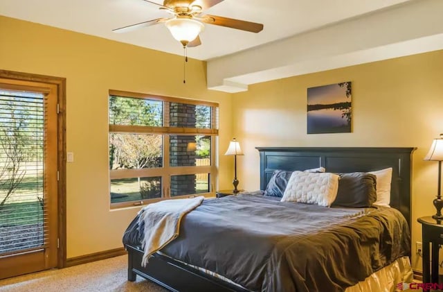 bedroom featuring ceiling fan and carpet flooring