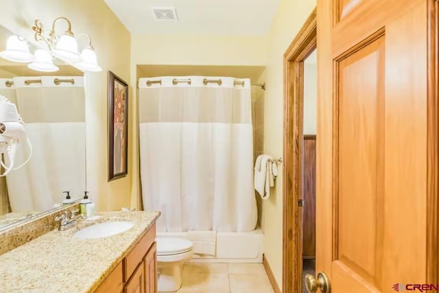 full bathroom featuring vanity, tile patterned flooring, shower / bath combination with curtain, and toilet