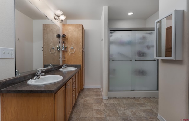 bathroom with vanity and walk in shower