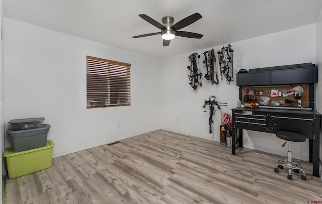 miscellaneous room with light hardwood / wood-style flooring and ceiling fan