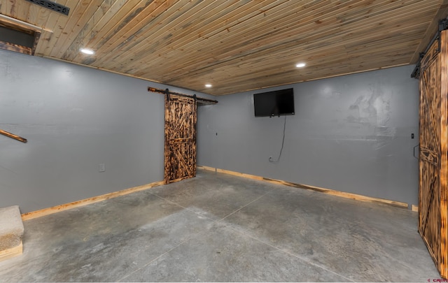 basement featuring a barn door and wood ceiling