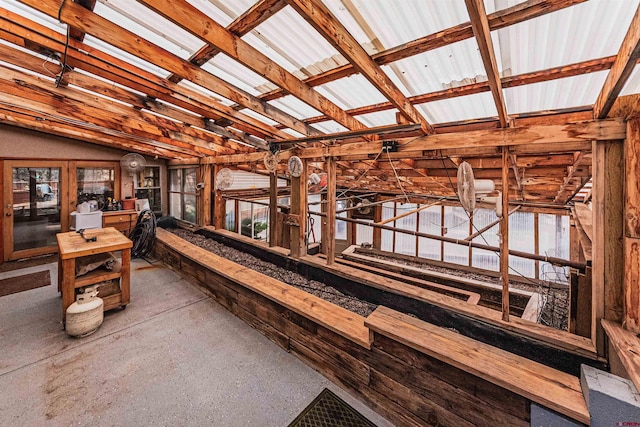 miscellaneous room featuring lofted ceiling