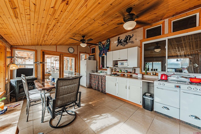 kitchen with lofted ceiling, white appliances, ceiling fan, white cabinetry, and wood ceiling