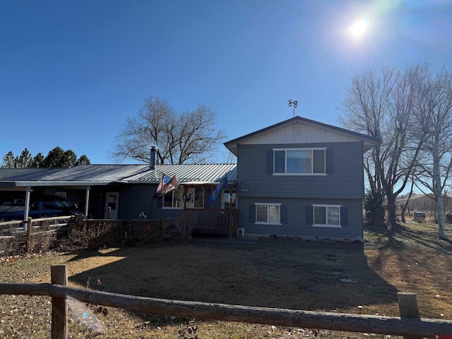 view of front of house featuring a carport