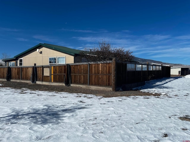 view of yard covered in snow