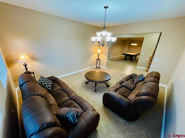 living room with carpet floors, a notable chandelier, and billiards