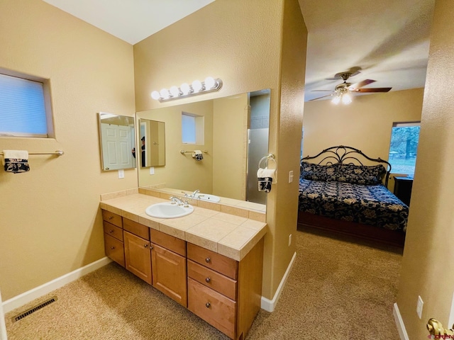 bathroom with vanity and ceiling fan