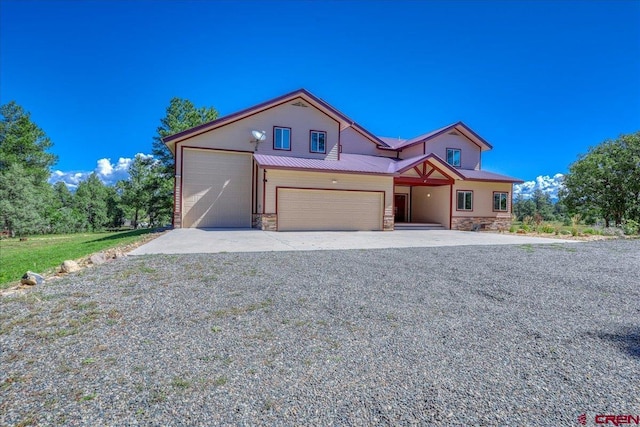 view of front of property featuring a garage