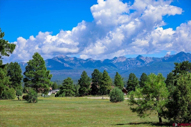 property view of mountains featuring a rural view