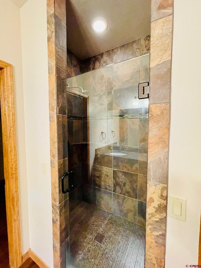 bathroom with walk in shower