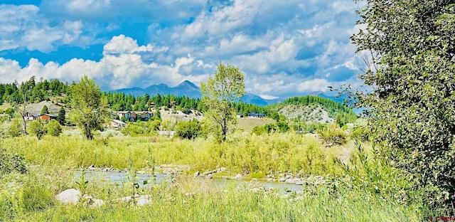 mountain view with a water view