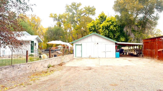 garage with a carport