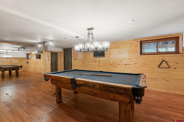 rec room with wood-type flooring, billiards, and wood walls