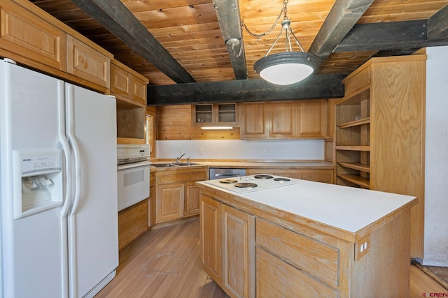 kitchen featuring beam ceiling, light hardwood / wood-style floors, white appliances, a kitchen island, and wood ceiling