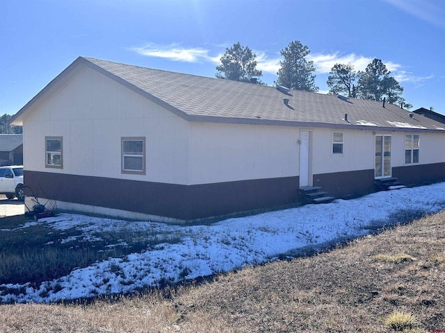 view of snow covered property