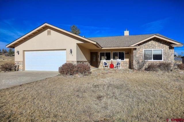 single story home featuring a garage