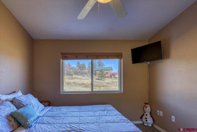 bedroom with carpet floors and ceiling fan