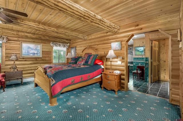 bedroom with log walls, beam ceiling, tile patterned flooring, and wood ceiling