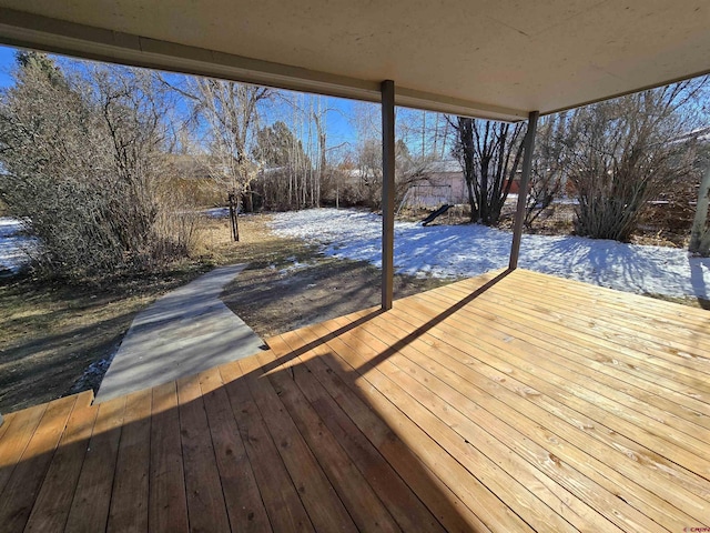 view of snow covered deck