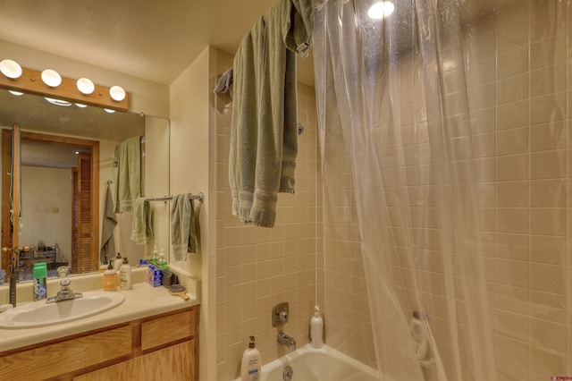 bathroom with vanity and shower / tub combo