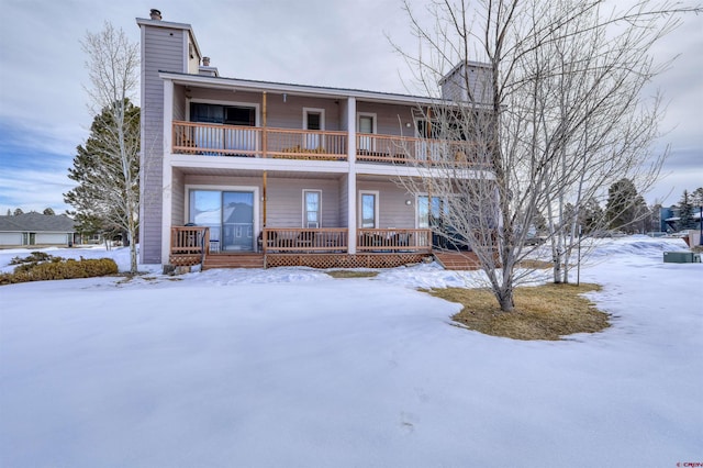 view of snow covered property