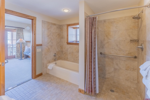 bathroom featuring tile patterned flooring and tile walls