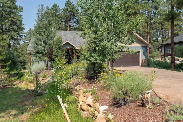 view of property hidden behind natural elements