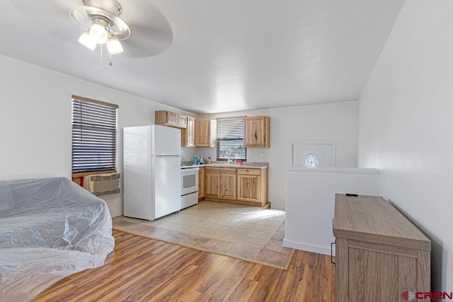 kitchen with ceiling fan, light hardwood / wood-style floors, and white appliances