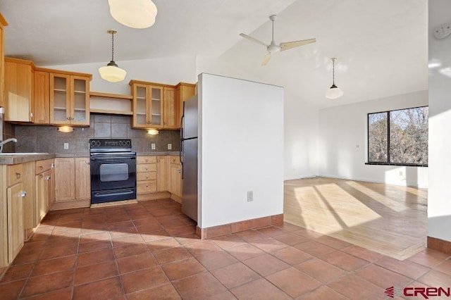 kitchen featuring ceiling fan, sink, tasteful backsplash, black electric range, and pendant lighting