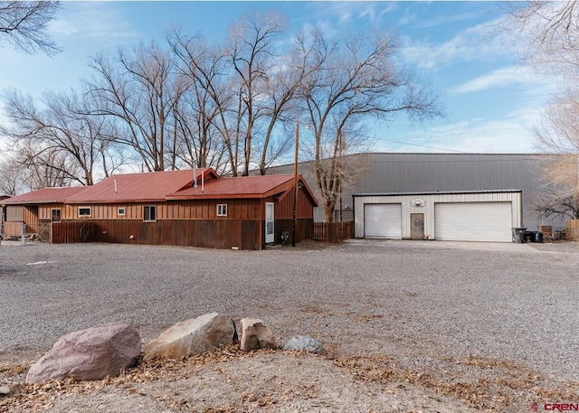 ranch-style house featuring a garage