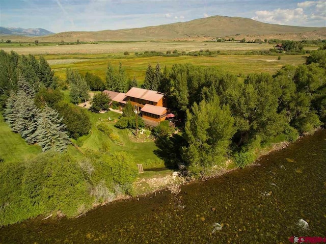 aerial view with a mountain view and a rural view