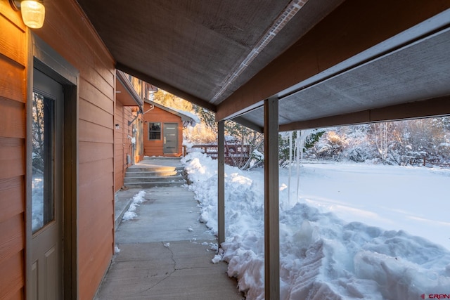 view of snow covered patio