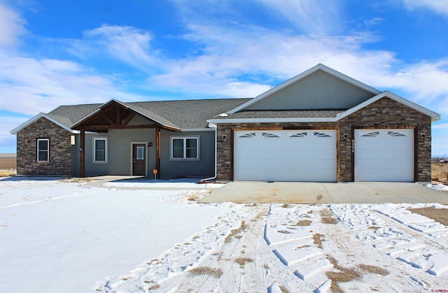 ranch-style home with a garage