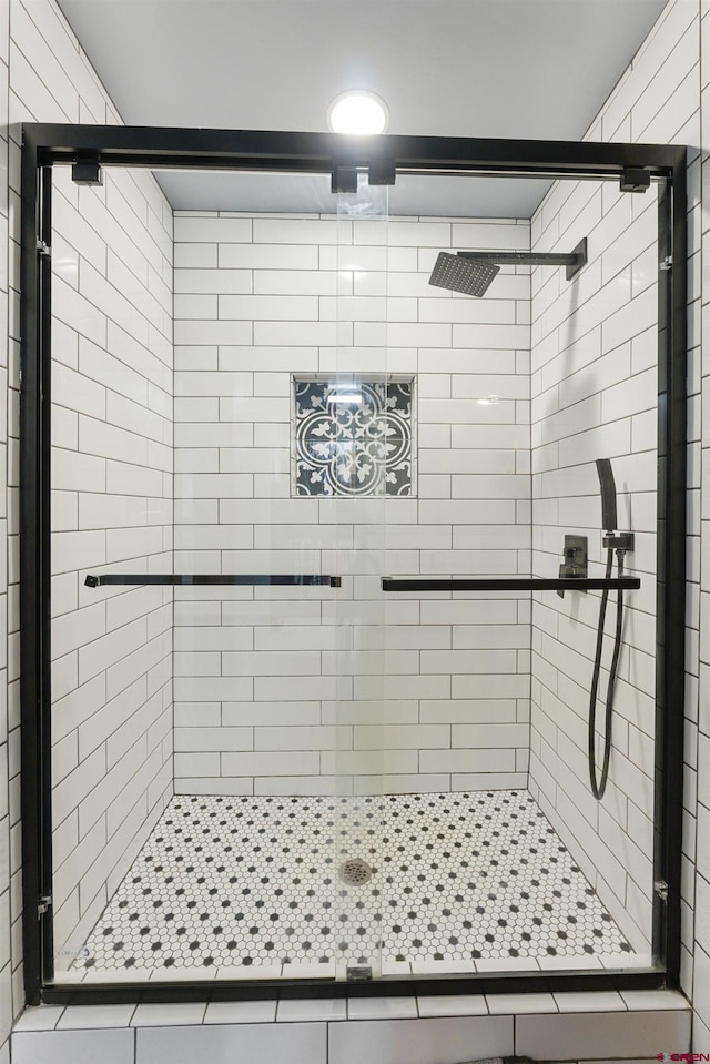 bathroom with an enclosed shower