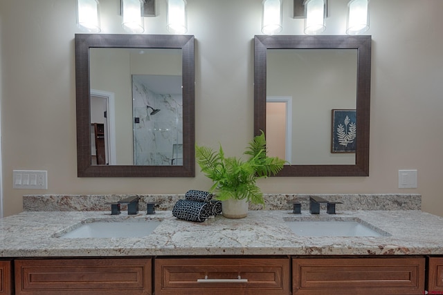 bathroom with vanity and walk in shower