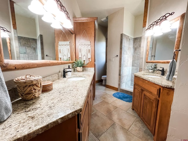 bathroom with tile patterned flooring and vanity