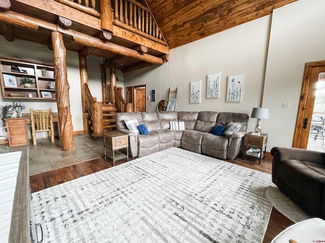 living room with vaulted ceiling and dark wood-type flooring