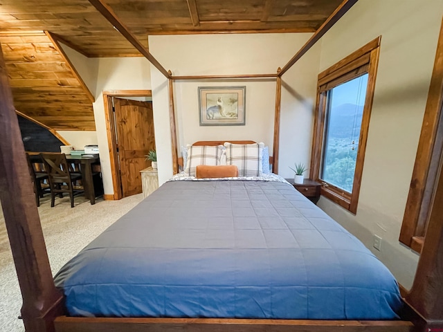 bedroom featuring light carpet and wooden ceiling