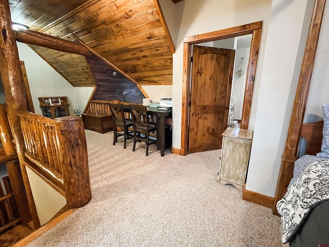 home office with light colored carpet, lofted ceiling, and wood ceiling