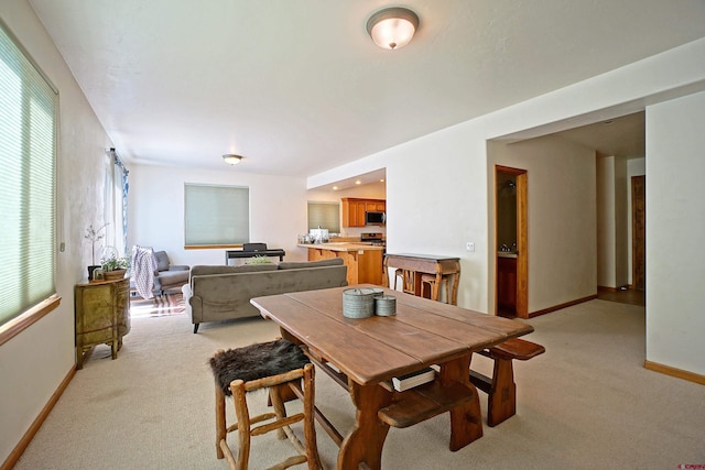 view of carpeted dining room