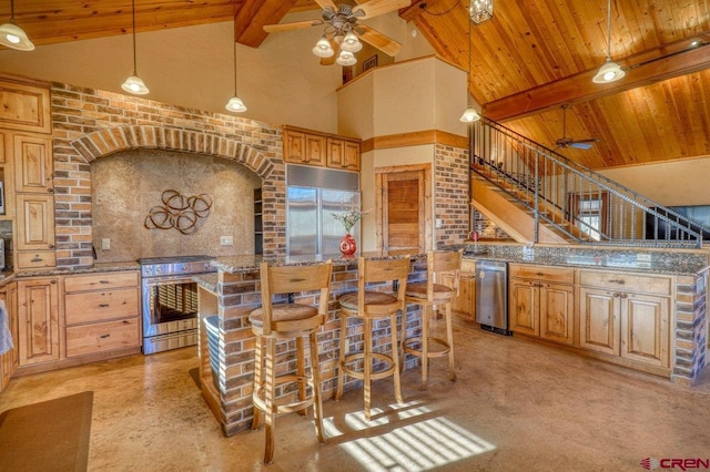 kitchen featuring beam ceiling, high vaulted ceiling, decorative light fixtures, wood ceiling, and appliances with stainless steel finishes