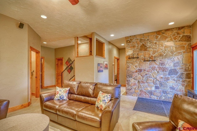 living room with a textured ceiling