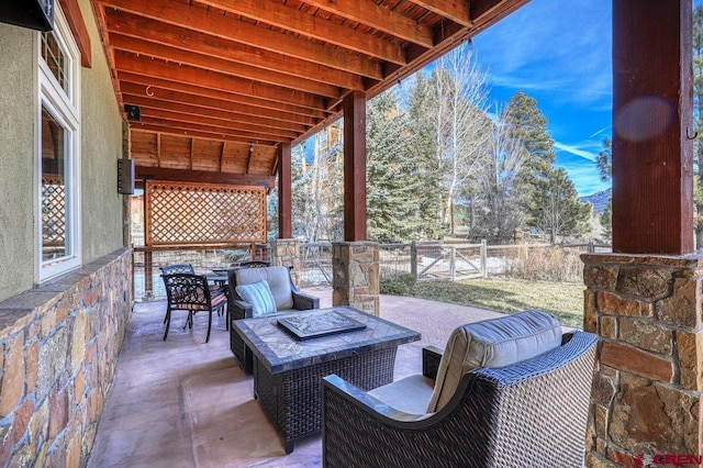 view of patio / terrace featuring a fire pit