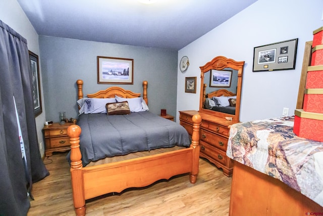 bedroom with light hardwood / wood-style flooring