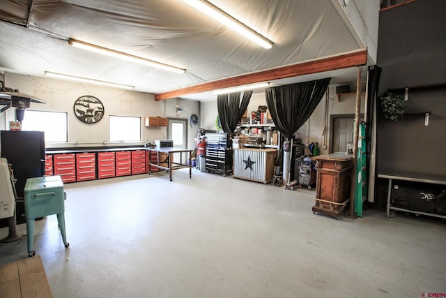 basement with a workshop area