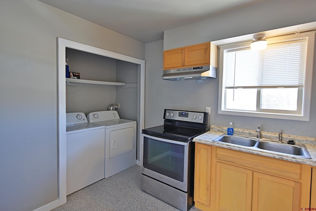 kitchen with electric range, washing machine and dryer, and sink