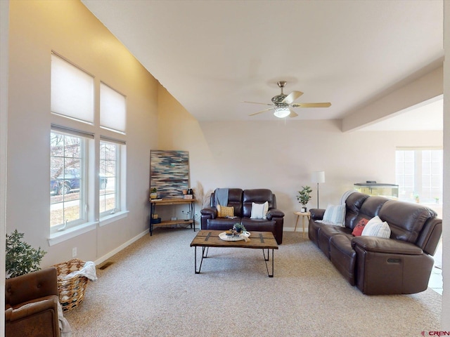 carpeted living room featuring ceiling fan